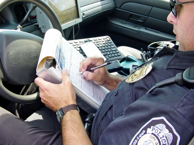 Police officer writing a ticket